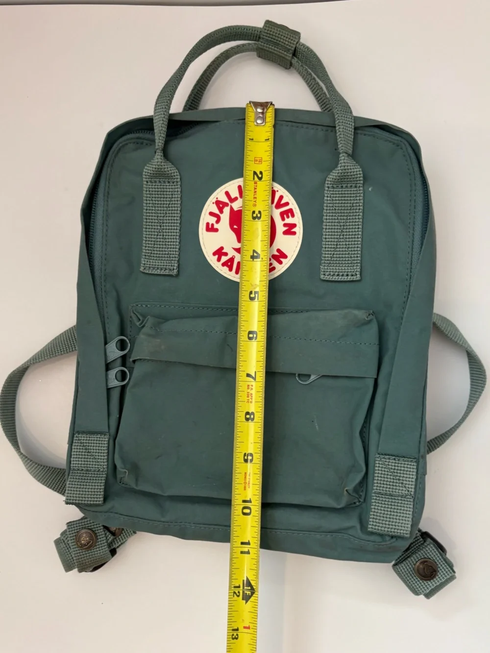 Fjallraven Kanken Mini Backpack in Sage Green with Red Logo